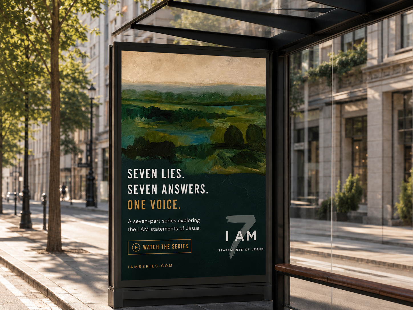 Seven I AM out-of-home poster in a city bus shelter.