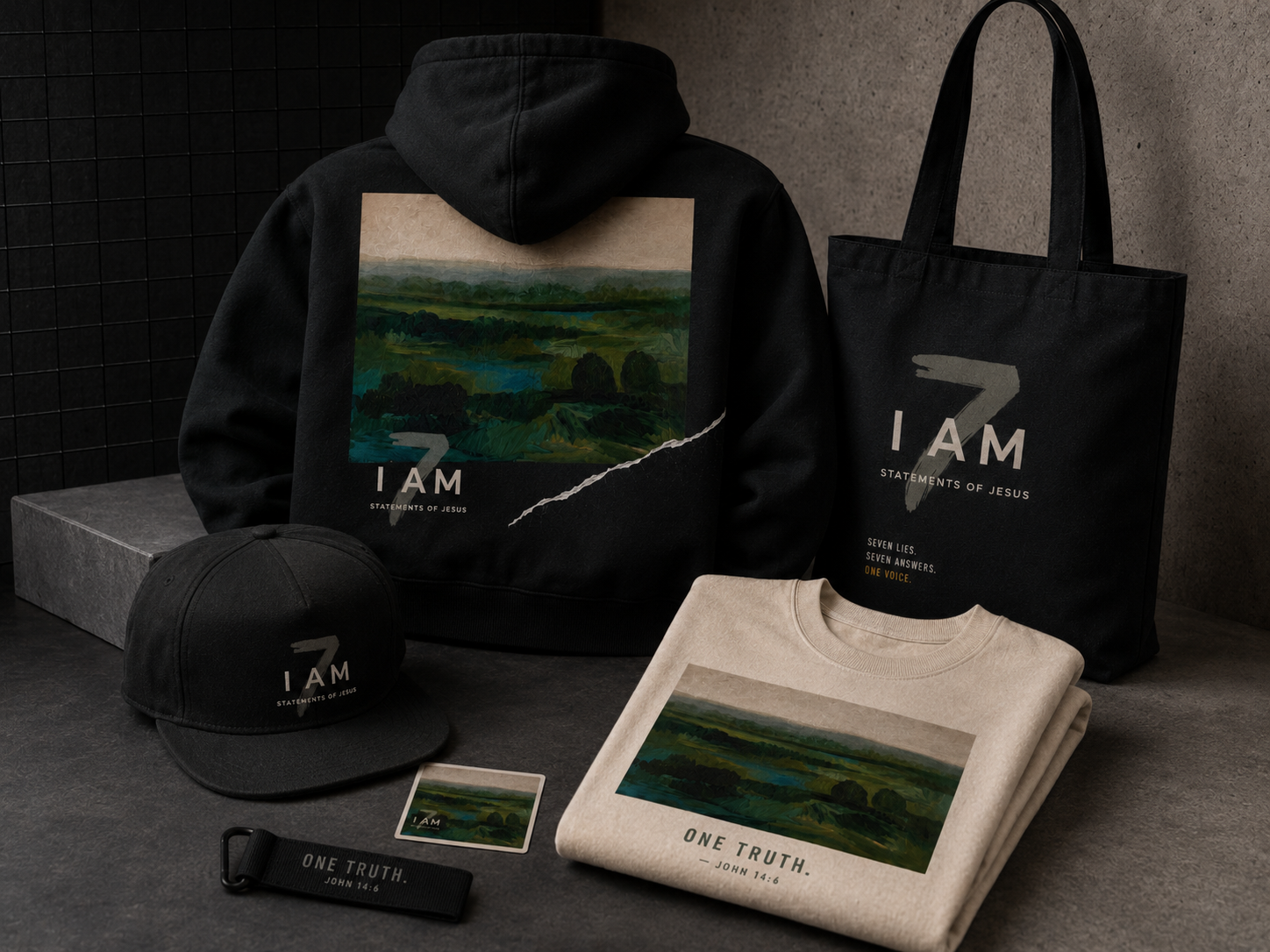 Seven I AM merch, hoodie, cap, journal, tote, and sticker sheet.